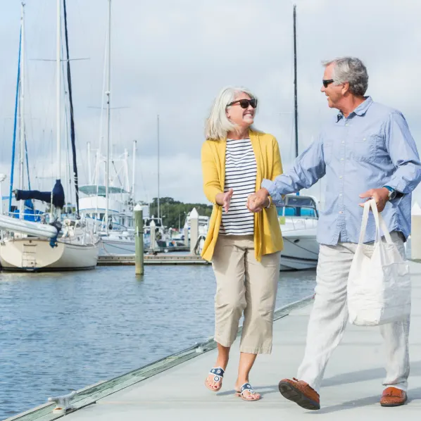 seniors walking on pier